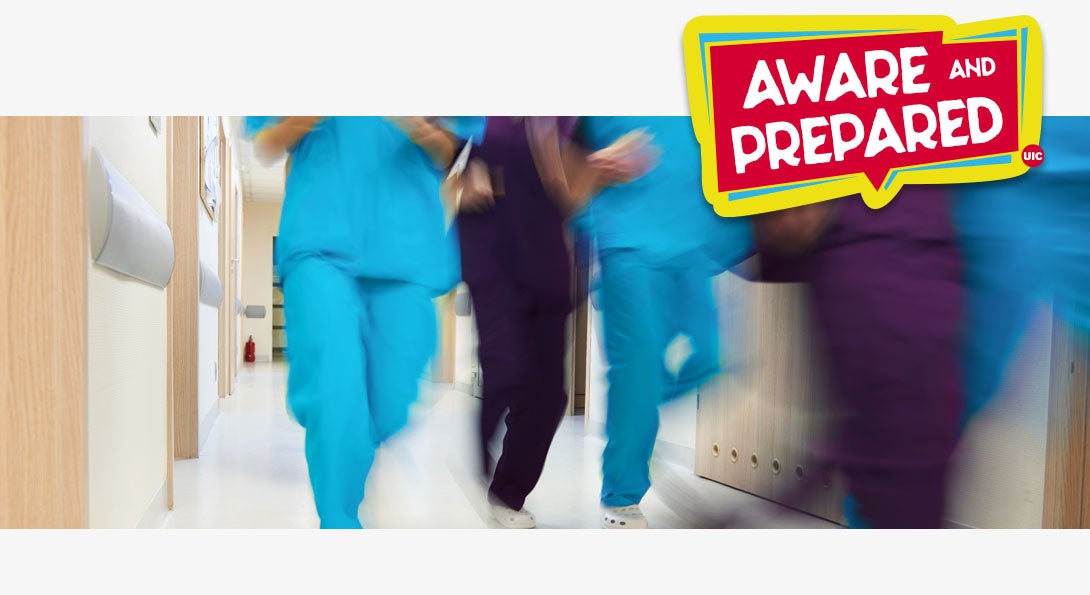 People in hospital scrubs running