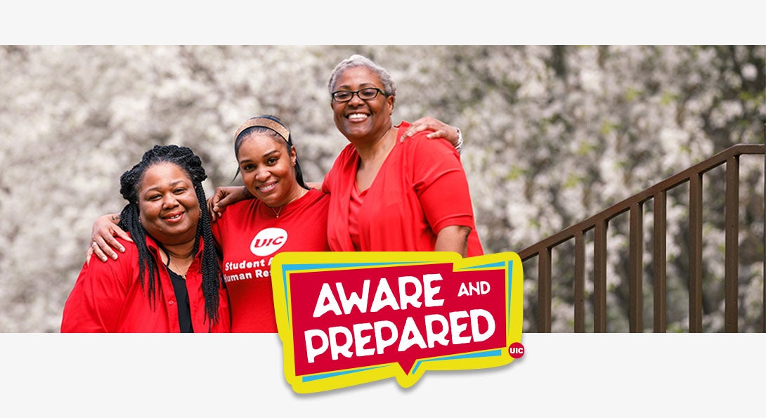 Two female employees and a female student look at the camera